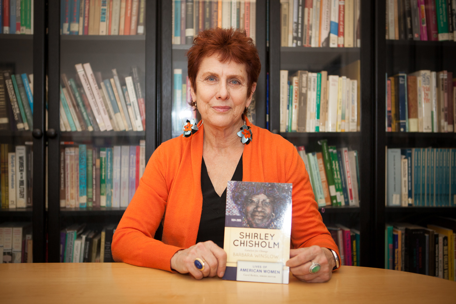 Project Director, Barbara Winslow holding her new Chisholm biography.