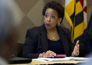 Attorney General Lynch speaks with congressmen and faith leaders after meeting in private with Freddie Gray's family at Baltimore University in Baltimore